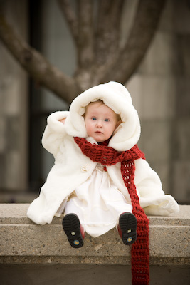 girl waiting on bench